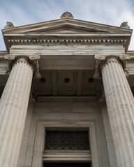 Obraz premium A triangular stone pediment with acroteria above a dentilled cornice