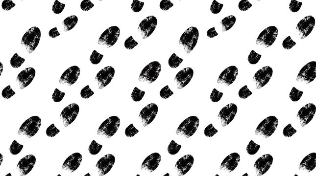 Black shoe footprints pattern on a white background for creative design