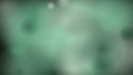 Abstract green blurred background with soft bokeh and glowing light spots texture © JALAL UDDIN