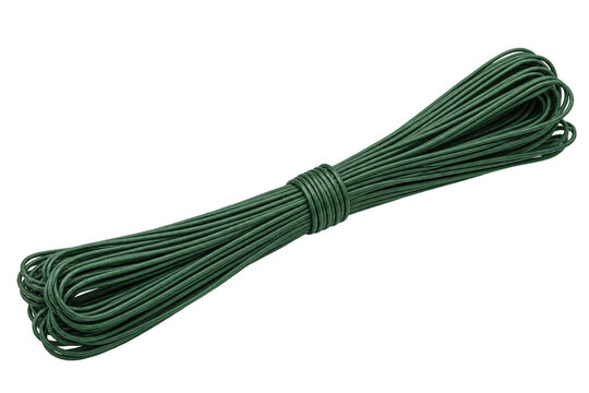 Bundle of green paper covered floral wire isolated on black