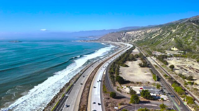 Aerial footage of Highway 1, Rincon Beach Park and Santa Barbara Channel, California