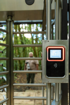 Turnstile access control system with card reader at park entrance