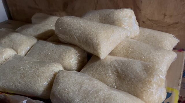 Close Up of White Refined Sugar Packed in Plastic Containers