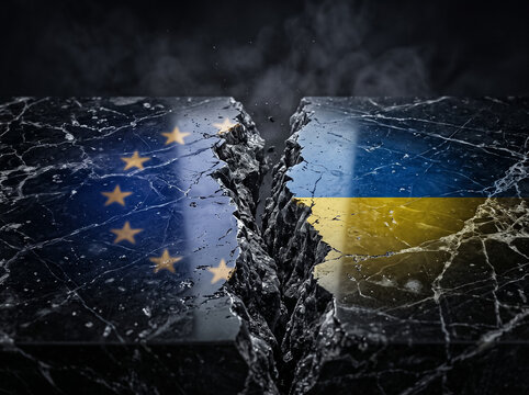 european union and ukraine split on marble slab symbolizes geopolitical conflict diplomatic contradiction and international relation on dark background with crack