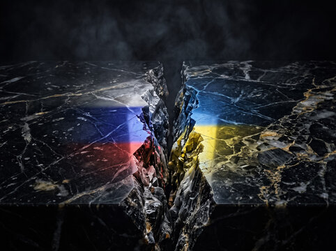 russia and ukraine split on marble slab symbolizes geopolitical conflict diplomatic contradiction and international relation of two countries on dark background with crack