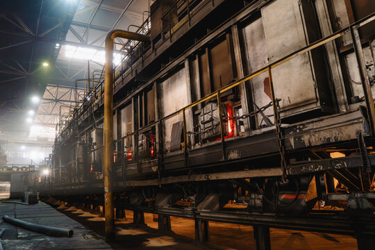 Annealing furnace for ductile iron pipe production, industrial heat treatment line used to develop strength and ductility after centrifugal casting.