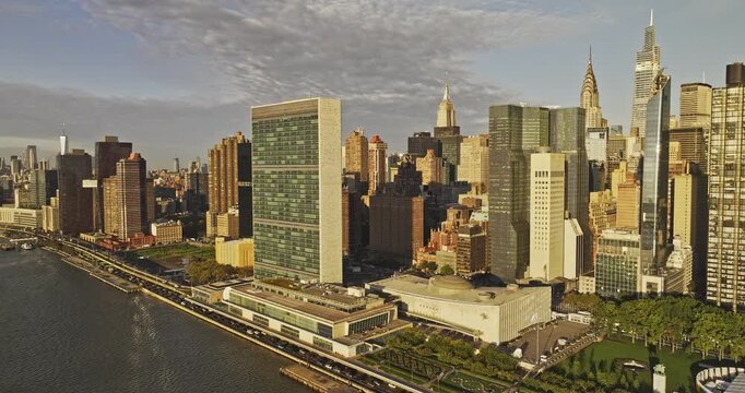 NYC New York Aerial v388 flyover East river capturing heavy FDR drive traffic, sunrise cityscape of Midtown Manhattan - Shot with Mavic 3 Pro Cine - September 2023