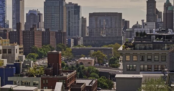 NYC New York Aerial v428 zoomed flyover East river across Dumbo neighborhood capturing cityscape of downtown Brooklyn and urban parks - Shot with Mavic 3 Pro Cine - September 2023