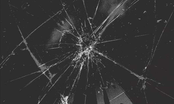 Shattered glass texture with radial cracks and broken fragments on a dark background