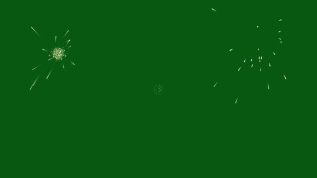 Firework tiny incandescent particles separating from the central flare, soft glowing remnants lingering afterward, festive evening visual, 4k motion green background