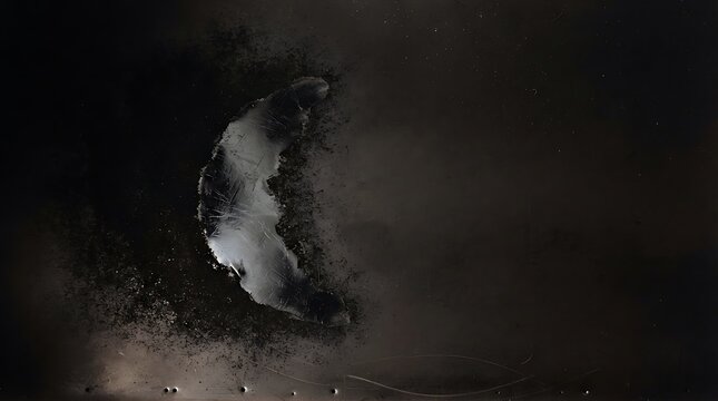 Abstract artistic representation of a crescent shape illuminated by soft light against a dark textured background for creative visual projects