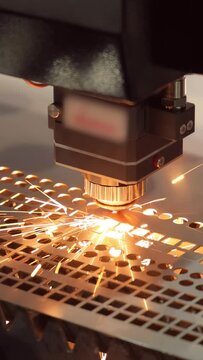 CNC Laser cutting of metal, modern industrial technology.