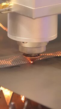 CNC Laser cutting of metal, modern industrial technology.