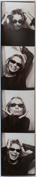 Playful Woman Posing in Vintage Photo Booth Strip