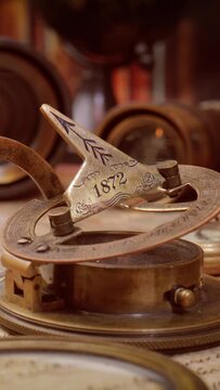 Vintage style travel and adventure. Vintage old compass and other vintage items on the table.