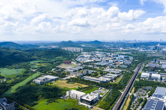 modern industrial park with city skyline beyond