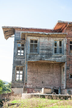 Abandoned wooden building with weathered facade showing decay and forgotten charm