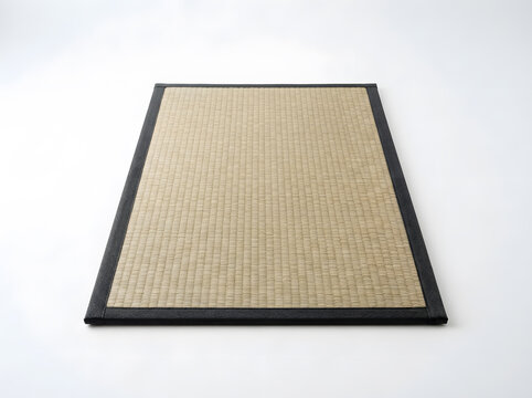Traditional Japanese tatami mat with black fabric border isolated on white