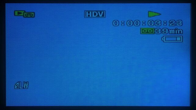Mini DV Camcorder Playback Screen with Running Timecode Counter from second 0-15, Blue LCD Display Overlay with Dark Frame.