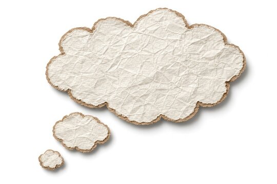 Crumpled paper thought bubbles in various sizes for communication, ideas, or speech on white background.
