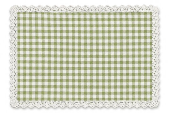 Green and white gingham checkered tablecloth with white lace trim on isolated white background for picnic or home decor.