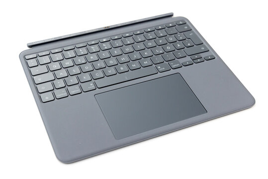 Modern gray tablet keyboard and touchpad on white background