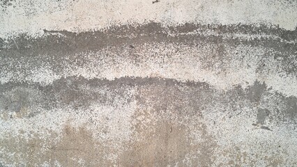 Distressed concrete wall texture with weathered grey and white plaster surface for background © Graphicdesigner83