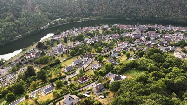 Aerial view of the river Meuse winding through the village of Montherme in France