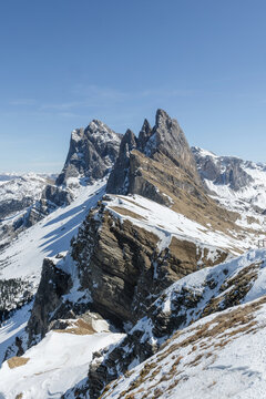 The scene shows snow covered mountains in Seceda, Dolomites, Italy, highlighting winter tourism and alpine scenery.