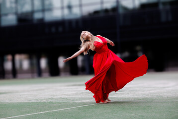 Dancer in Flowing Red Dress