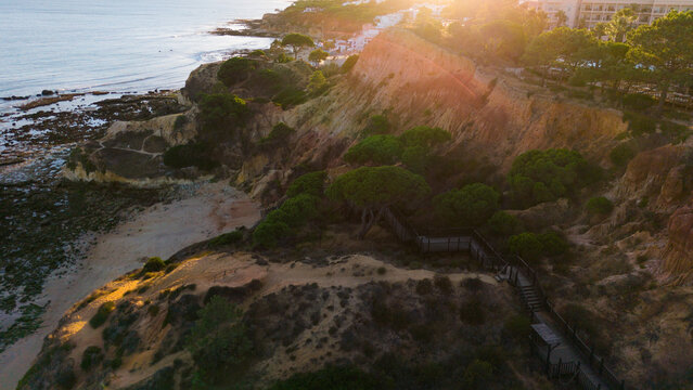 Aerial rocks and cliffs seascape shore view of famous Falesia beach, Algarve.