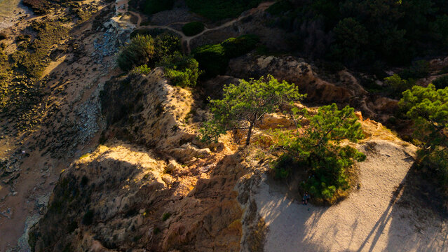 Aerial rocks and cliffs seascape shore view of famous Falesia beach, Algarve.