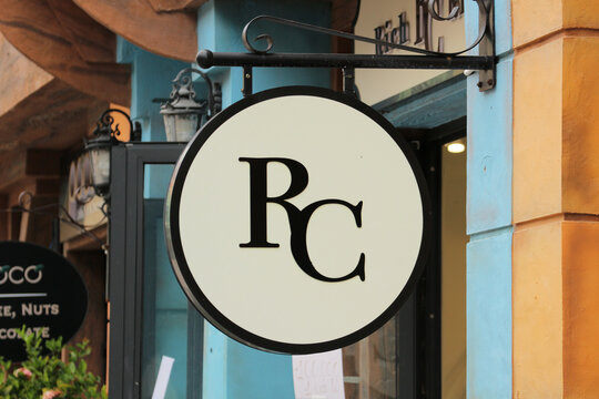 Round outdoor signboard with RC monogram letters of the Rich Rich boutique clothing store at Vinpearl in Nha Trang, Vietnam on January 27, 2026.