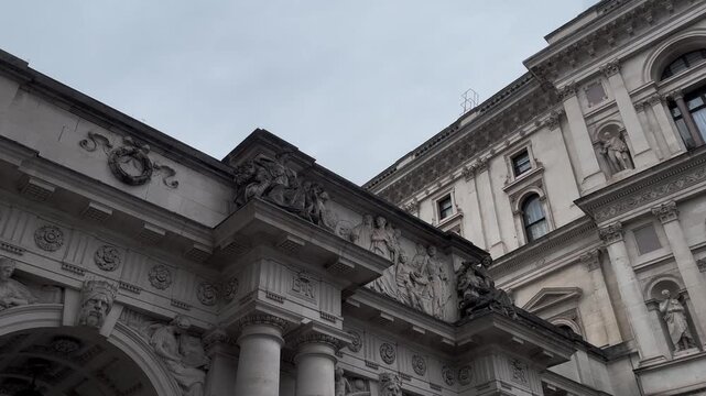 Classic Historic Stone Architecture with Arches and Statues in London
