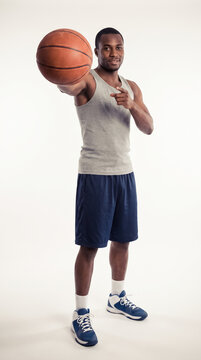 Basketball player holding ball