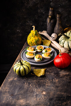 Deviled eggs decorated with skull Halloween food