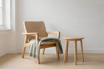 Obraz premium Quiet Nordic interior with light ash lounge chair beside a round side table