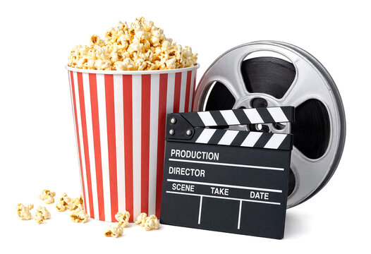 Classic movie night setup with popcorn bucket film reel and clapperboard for cinematic entertainment theme