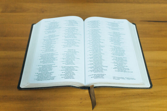Bible on Wooden Table with Bookmark, Christian Faith and Spirituality Concept