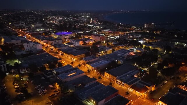 CALIFORNIA - 9.2.2026 - Great aerial footage starting to circle downtown Ventura, California near the coast at night.