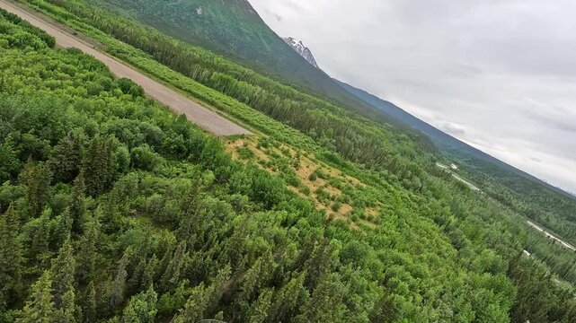 ALASKA - 9.3.2026 - View from a small aircraft as it lands on a dirt runway near snow-capped mountains in Alaska's Wrangell�St. Elias National Park and Preserve.