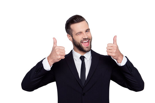 Portrait of excited satisfied cunning cheerful confident curious positive delightful handsome creative active laughing freelancer demonstrating thumbs-up pointing up isolated on gray background shirt