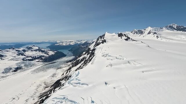 ALASKA - 9.3.2026 - Remarkable aerial footage moving along snowy peaks of Alaska's Wrangell�St. Elias National Park and Preserve, bound for Tebay Lakes.