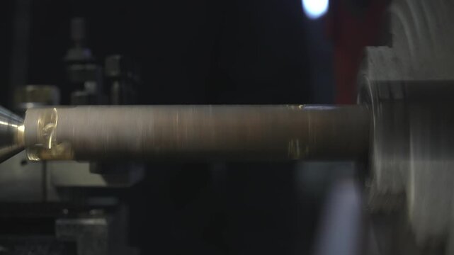 A time-lapse of the process of manufacturing a metal part from a blank on a CNC lathe using drills and cutting tools.
