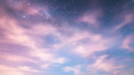 Fototapeta premium Starlit night sky with soft pink and blue clouds and milky way galaxy