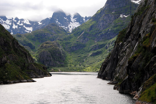 The narrow entrance, surrounded by steep-sided mountains of the small 2-kilometre (1.2 mi) long Trollfjord or Trollfjorden, on Austv&aring;g&oslash;ya island, Lofoten, Vester&aring;len, Nordland county, Norway 