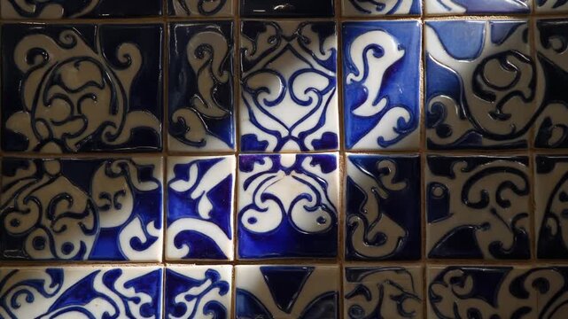 Light shifting across iznik tiles