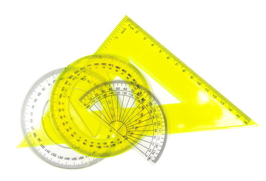 Colorful transparent rulers, triangles and protractors isolated on white background, top view