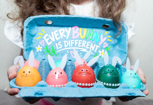 Every Bunny Is Different Colorful Handmade Easter Eggs and Kids Craft Concept