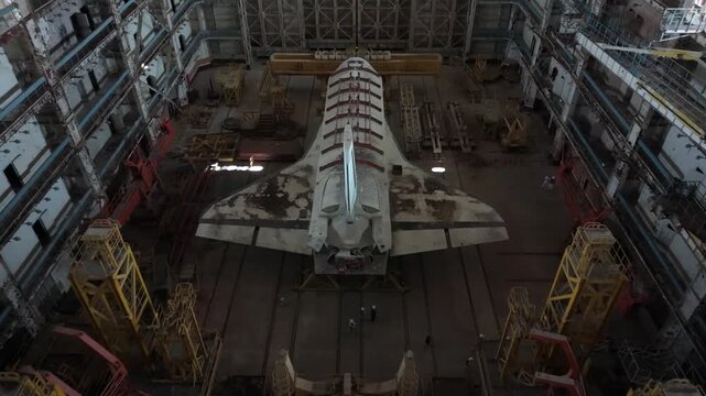 Aerial view of the abandoned Buran space shuttle inside a massive hangar at the Baikonur Cosmodrome in Karmakshy District, Kyzylorda Region, Kazakhstan.